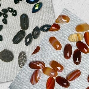 Lot of red & orange banded carnelian & onyx agate gemstones for jewelry making
